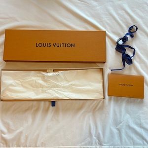 Louis Vuitton W: 3” L: 15.75” x D:1.25” gift box with 60” ribbon